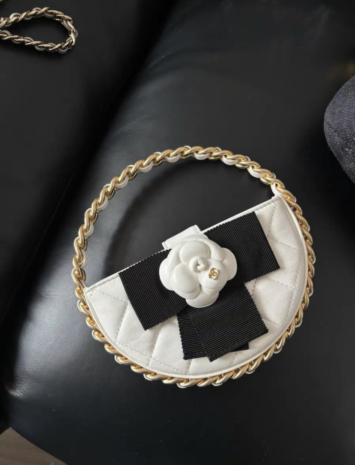 Chanel 23 White Quilted Leather Mini Round Camellia Clutch