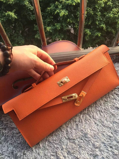 Luxury Hermes Orange Handcrafted Kelly Cut Clutch