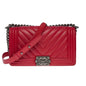 Chanel Boy Old Medium shoulder bag in red quilted herringbone leather, SHW
