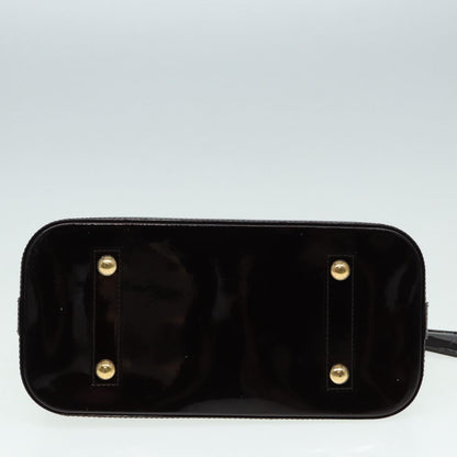 LOUIS VUITTON Alma Handbag