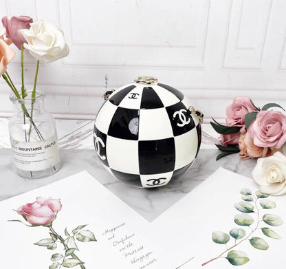 Chanel Black And White Resin And Enamel Checker Sphere Minaudiere Pale Gold Hardware 2023