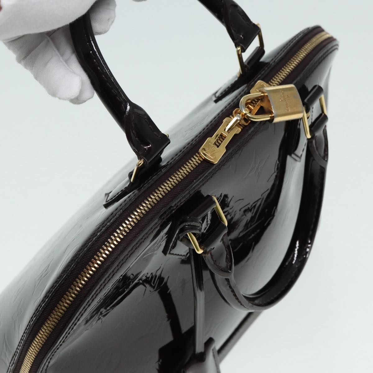 LOUIS VUITTON Alma Handbag