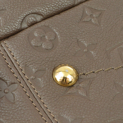 Louis Vuitton 2012 Brown Monogram Empreinte Artsy MM Handbag M93447