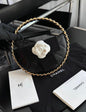 Chanel 23K Camellia Hula Hoop Bag Black