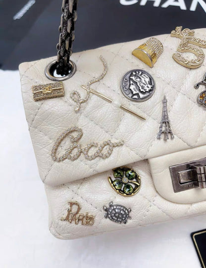 Chanel Pearl White Quilted Leather Limited Edition Lucky Charm Reissue 2 55 Classic Flap Bag