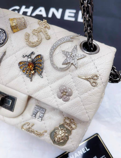 Chanel Pearl White Quilted Leather Limited Edition Lucky Charm Reissue 2 55 Classic Flap Bag