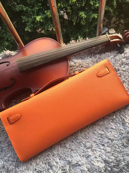 Luxury Hermes Orange Handcrafted Kelly Cut Clutch