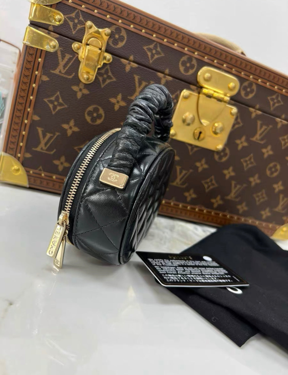 Chanel Cc Ruched Oval Top Handle Quilted Lambskin Mini