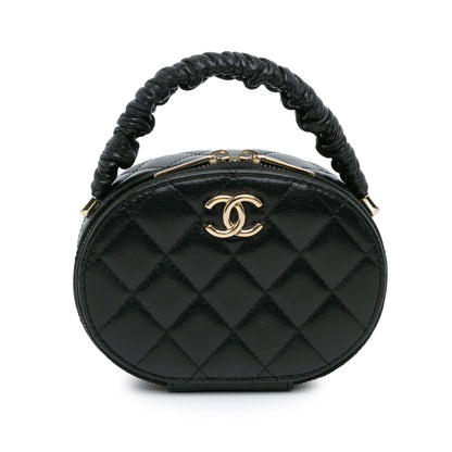 Chanel Cc Quilted Lambskin Oval Top Handle Clutch
