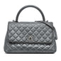 Chanel Small Quilted Aged Calfskin Coco Top Handle Bag