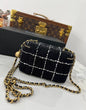 Chanel 23K Black White Tweed Mini Vanity Case Gold Chain
