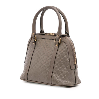 Gucci Mini Microguccissima Dome Satchel