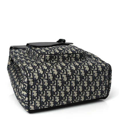 Christian Dior Oblique Jacquard Grained Calfskin Drawstring Saddle Backpack Beige Black Oblique Monogram