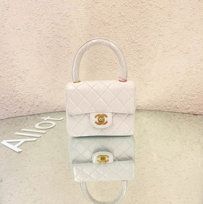 Chanel White Quilted Lambskin Cc Top Handle Mini Kelly Bag Gold Hardware 1994