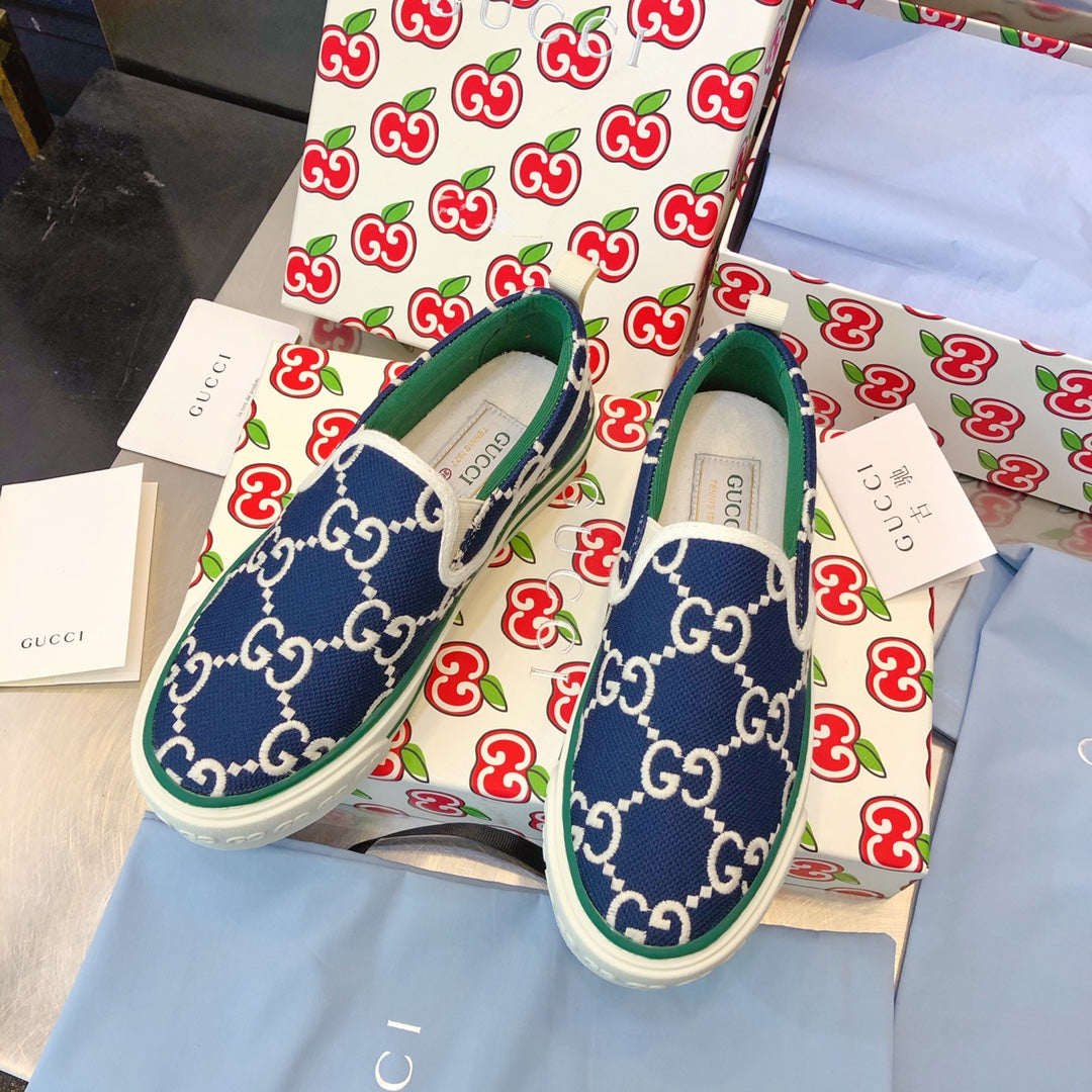 G u c c I slip ons
