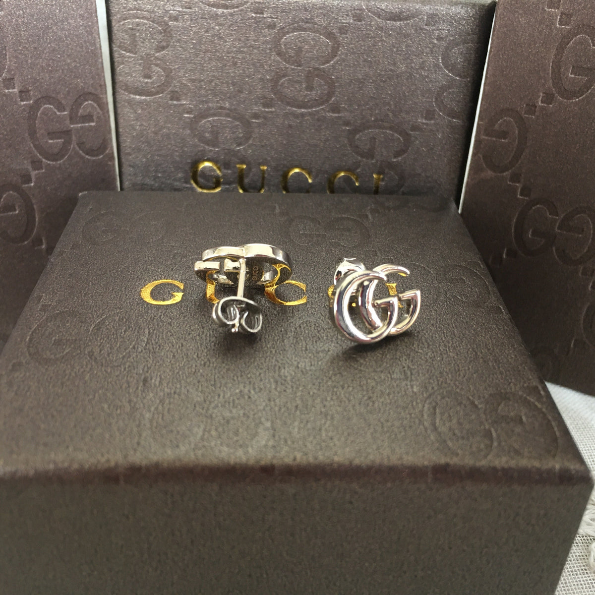 G u c c I earrings