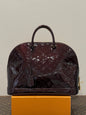 Louis Vuitton - Sac Alma cuir empreintes verni