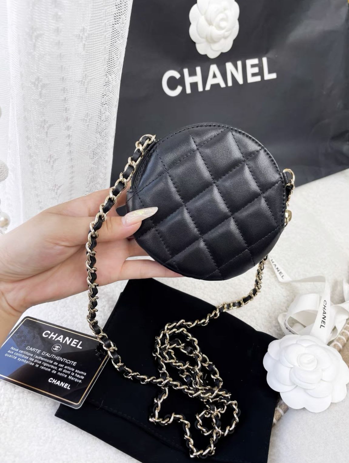 Chanel Black Camellia Round Chain Bag