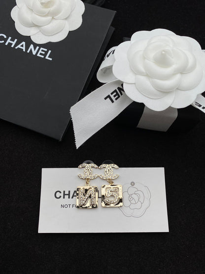 number 5 earrings