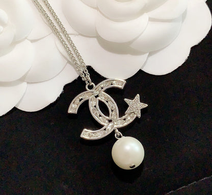 pentagram pearl earrings