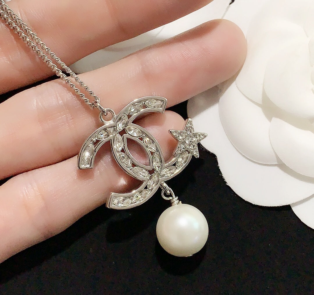 pentagram pearl earrings