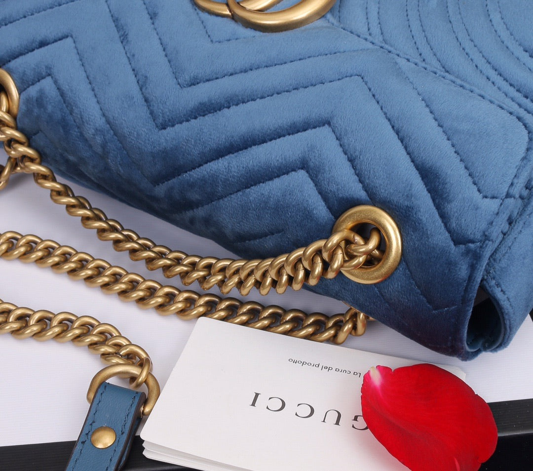 velvet blue handbag