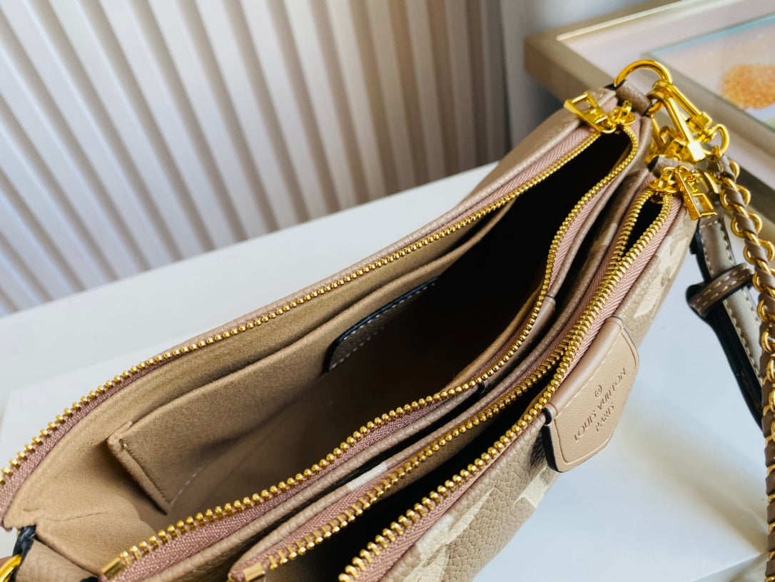 L v pochette