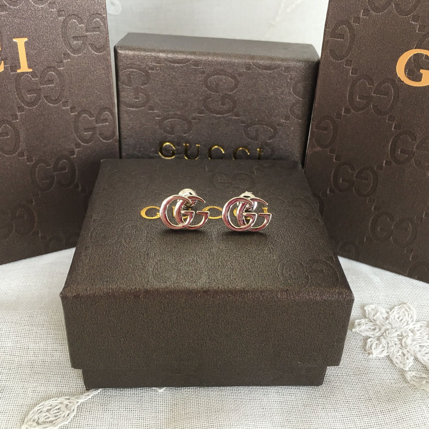 G u c c I earrings