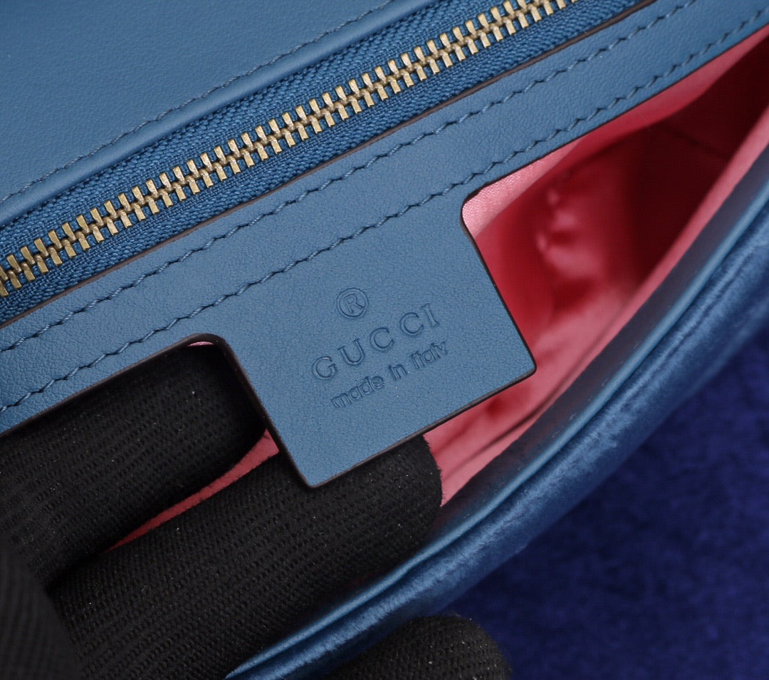 velvet blue handbag