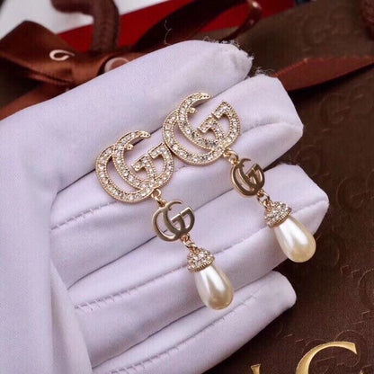 G u c c I earrings