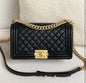 C h a n e l boy black/gold