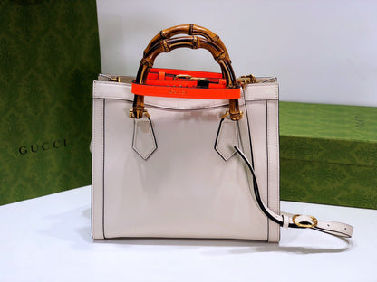 G u c c i white 20x 16x 10 or 27x 24x 11